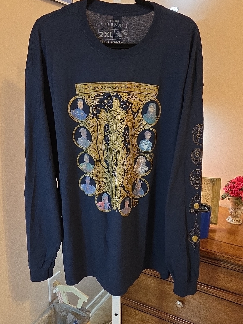 Eternals Black Graphic Long Sleeve Band Tee with Gold Accents